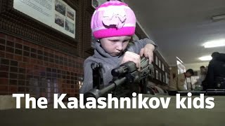 Watch these Russian children assemble and dismantle Kalashnikov rifles in seconds [upl. by Ynafit]