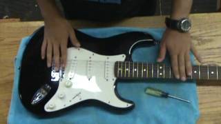 Adjusting a guitar tremolo system [upl. by Carleton]